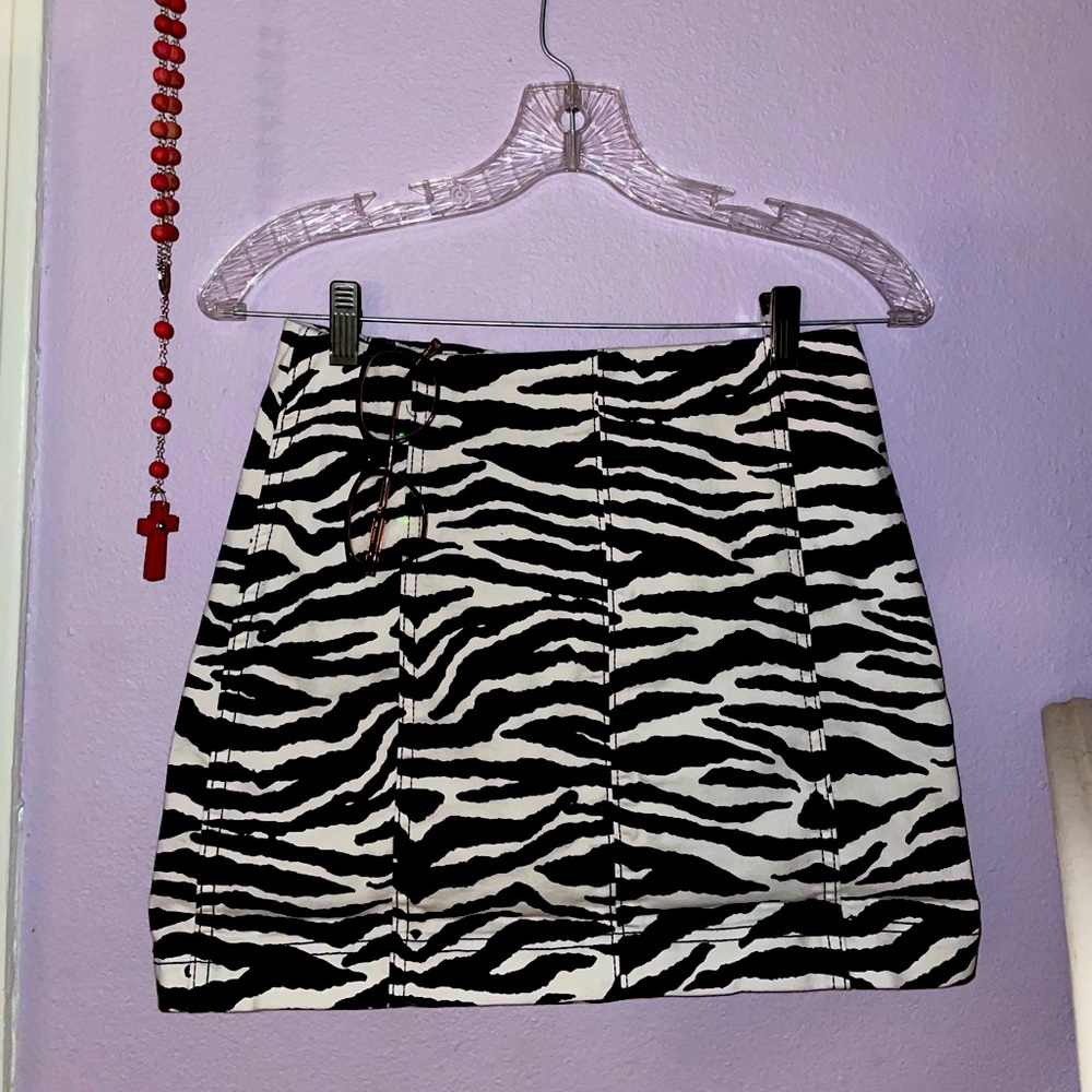 Peppermayo Keiko Mini Skirt (decorated in a white black zebra print)